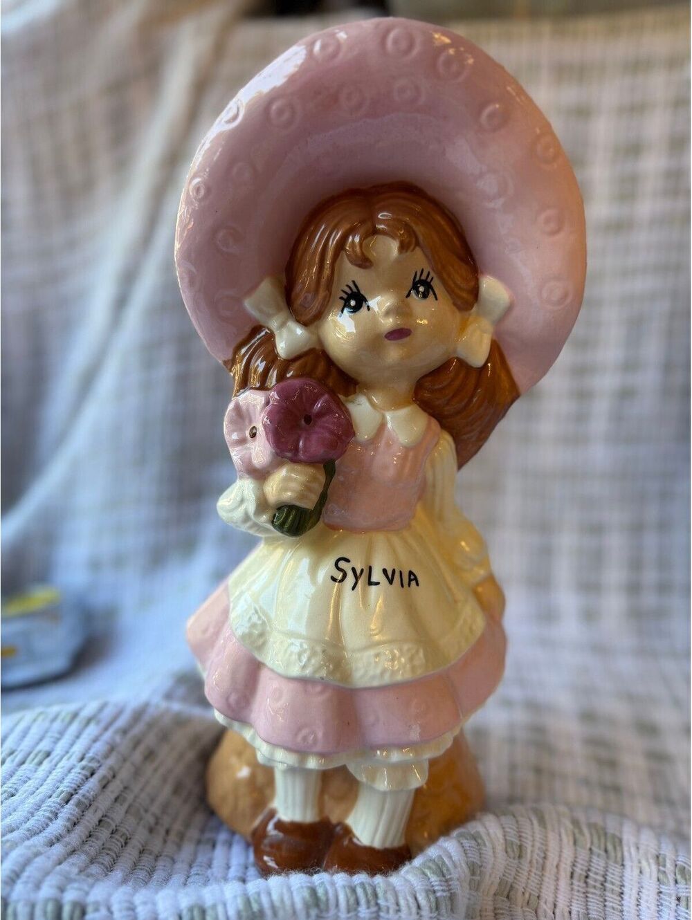 FIGURINE Vintage Sylvia Ceramic Figurine Girl with Pink Hat and Flowers